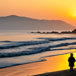 Jeongdongjin Sunrise**

"The breathtaking sunrise over Jeongdongjin beach, South Korea. The sky is painted with warm orange and yellow hues, reflecting on the calm sea.  A few silhouetted figures are watching the sunrise, fully clothed in jackets. Safe for work, appropriate content, family-friendly. Perfect anatomy, natural proportions, professional landscape photography, high quality."

**
